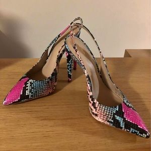 Women’s snake print heels.